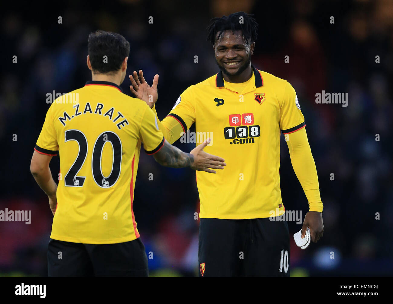 Watford's Mauro Zarate (left) and Watford's Isaac Success ater the final  whistle during the Premier League match at Vicarage Road, Watford Stock  Photo - Alamy