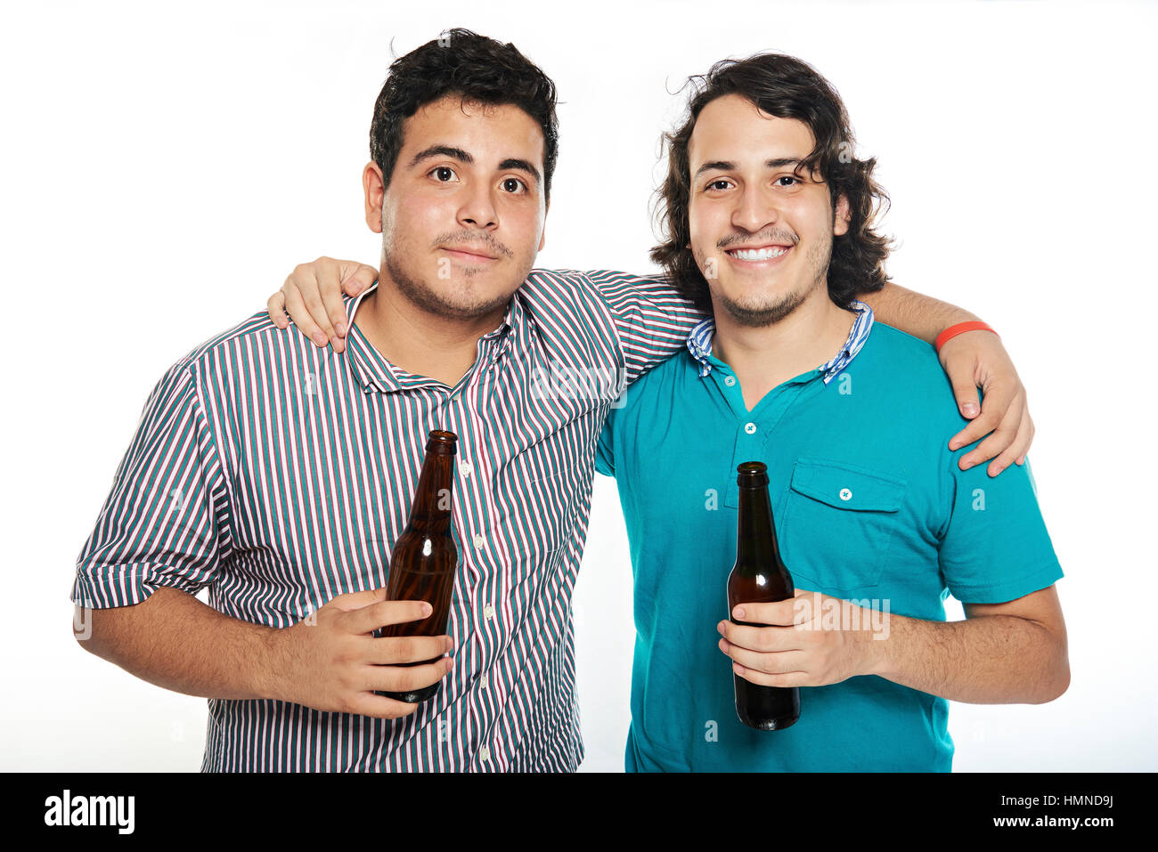 two friends with beers isolated on white Stock Photo