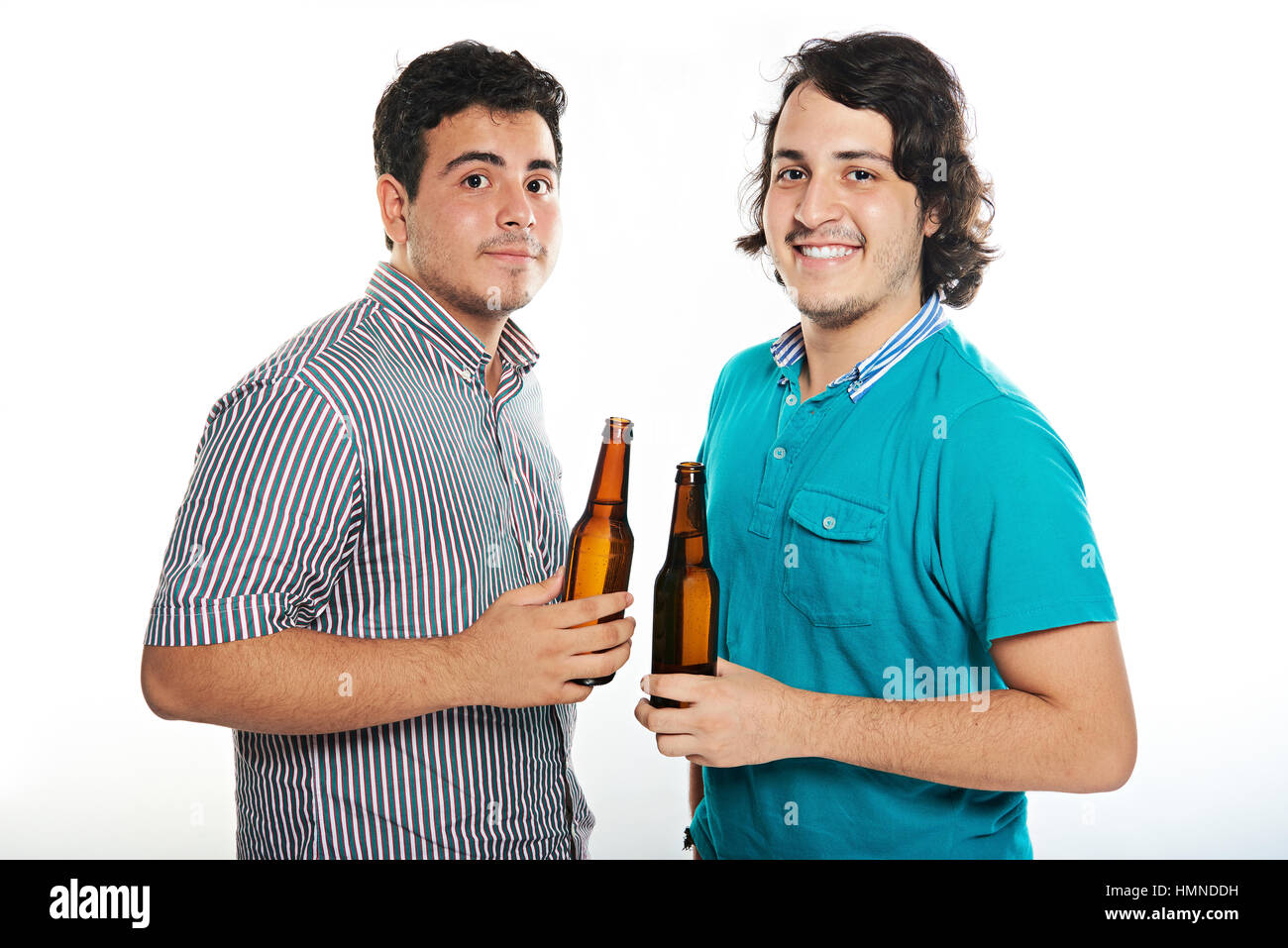 two dudes with beers bottle isolated on white Stock Photo