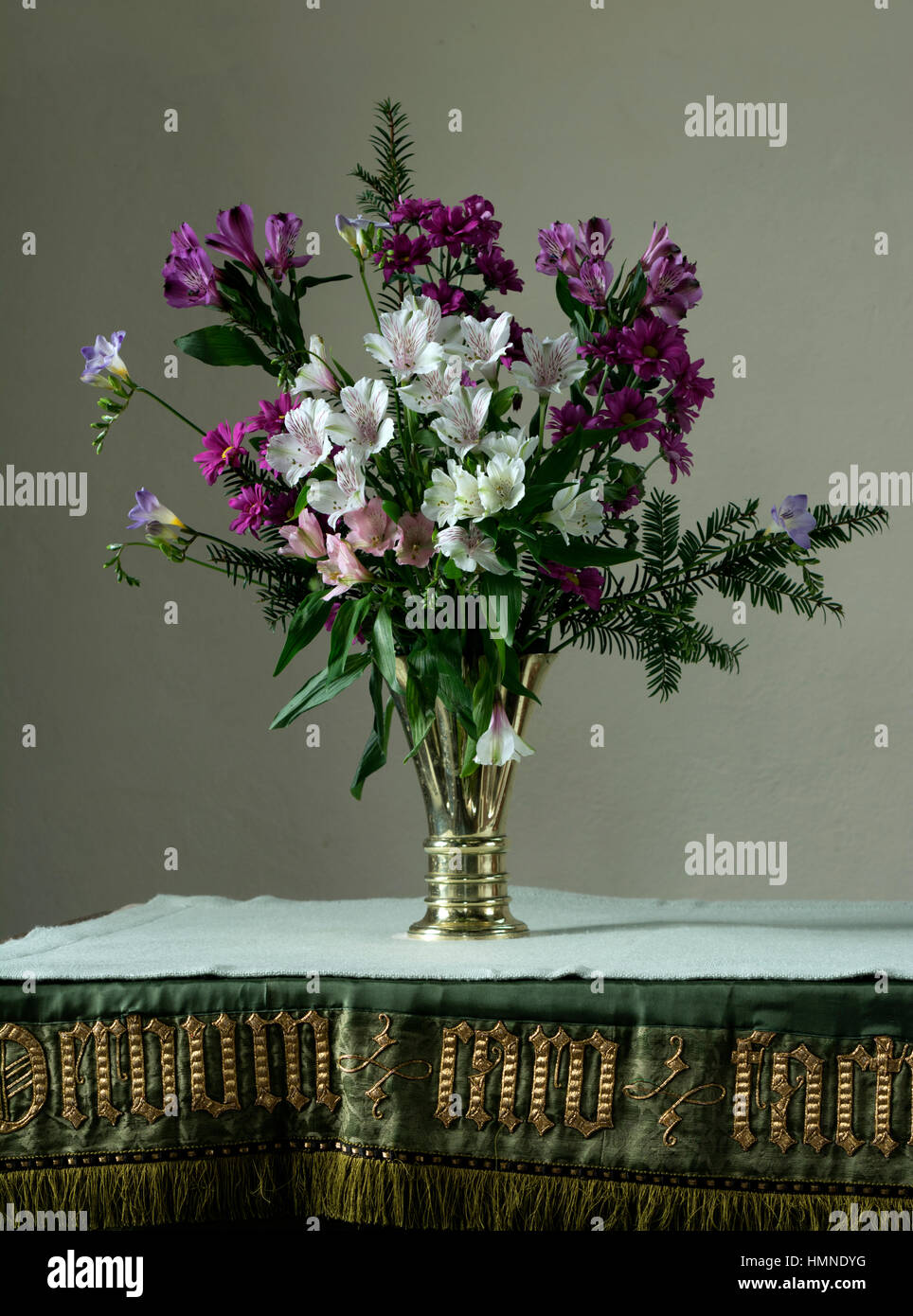 A flower arrangement on a church altar Stock Photo Alamy