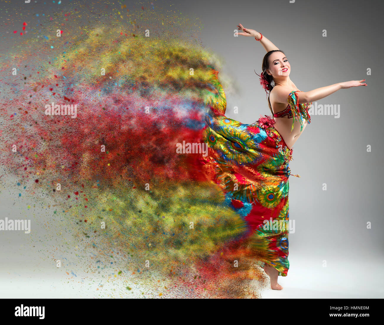 Dancer with disintegrating dress. Abstract vision.Photo manipulation Stock Photo