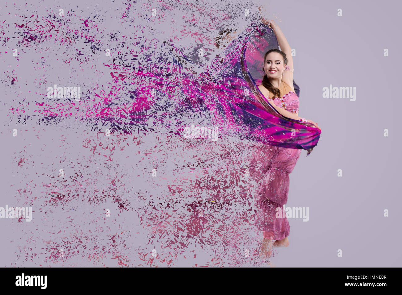 Dancer with disintegrating scarf. Abstract vision.Photo manipulation Stock Photo