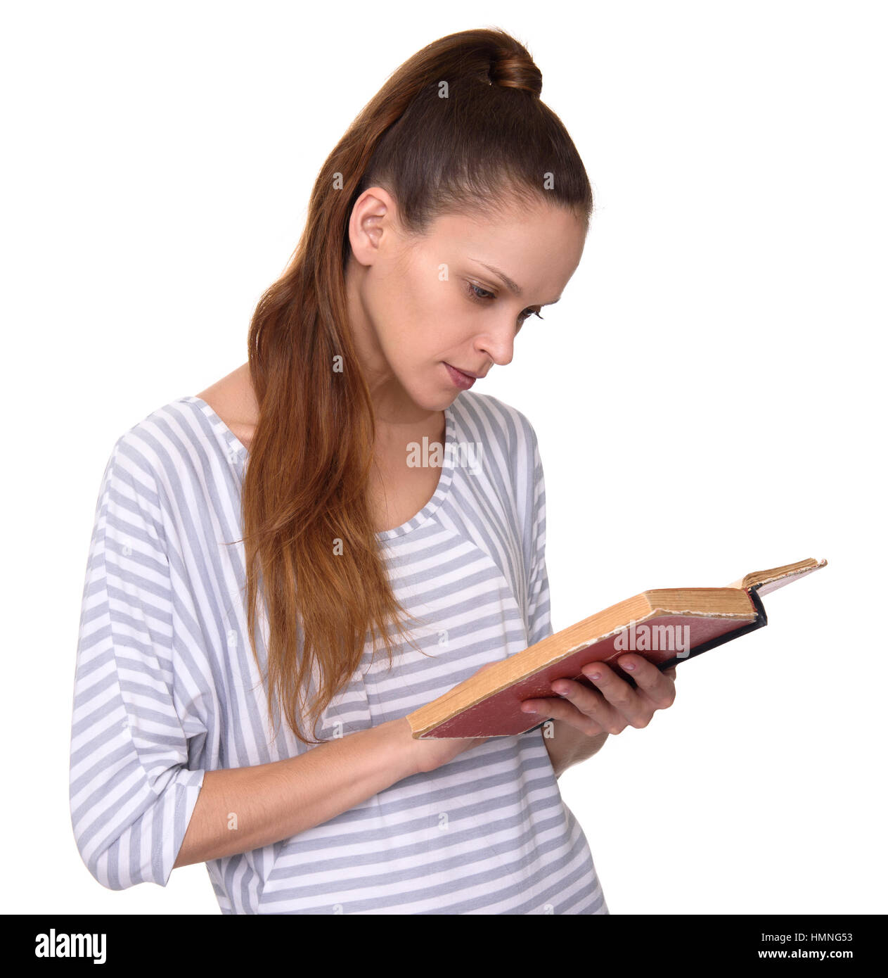 cute girl reading a book isolated on white background Stock Photo - Alamy