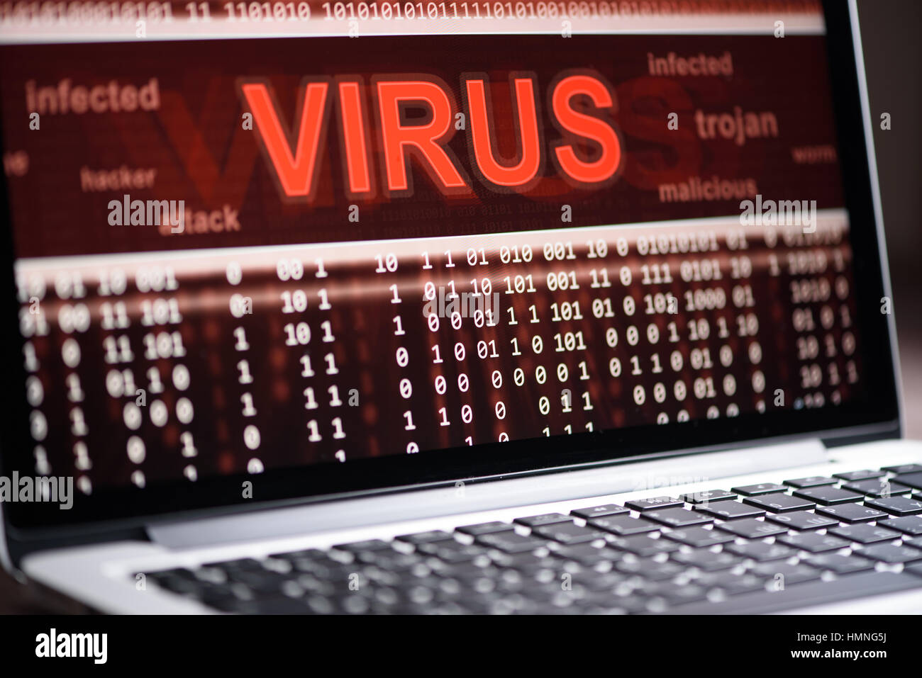 Computer virus protection concept. Alert of hacker attacks on the laptop screen Stock Photo