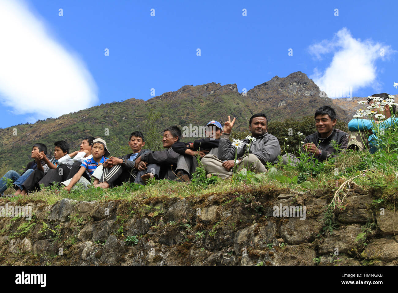 Porters waiting for their customer at Lukla Airport Stock Photo