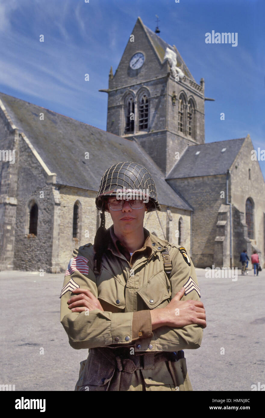 Normandy (France), war veterans and collectors of vintage military vehicles participate the yearly ceremonies for the commemoration of the allied landing of June 1944, 82nd Airborne Division paratrooper on the Saint Mere Eglise square Stock Photo