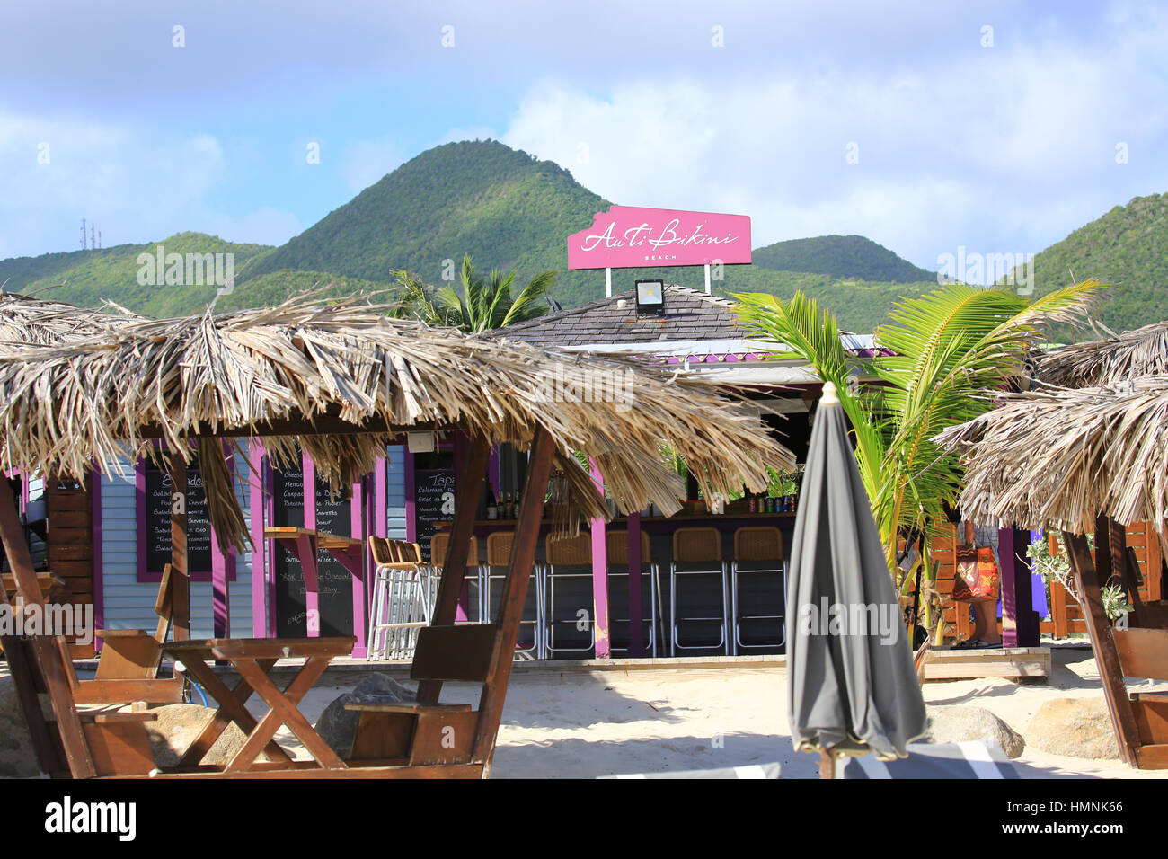 A beach bar on Orient Bay Beach before it gets busy on the island of St. Martin Stock Photo