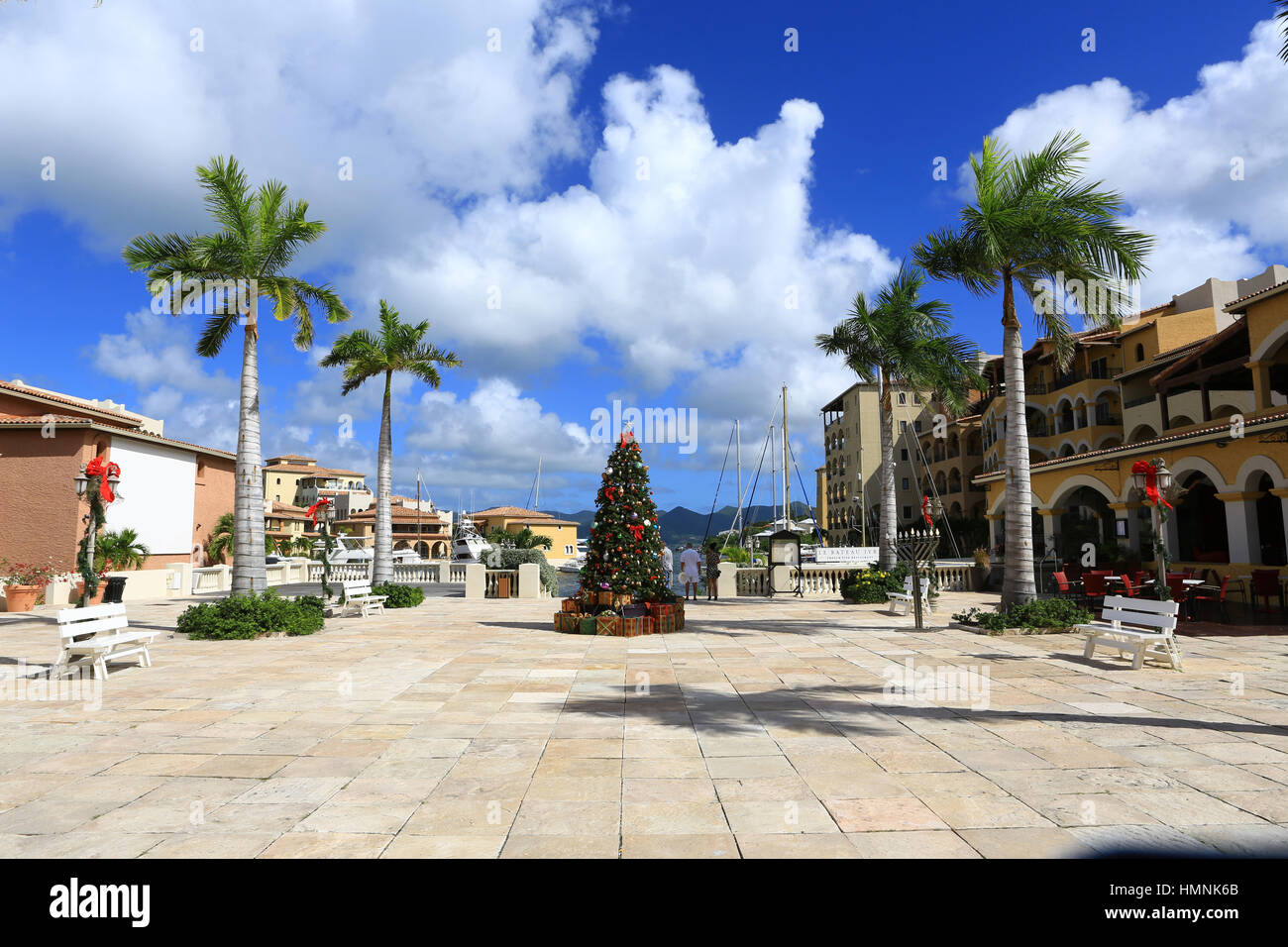 The Porto Cupecoy Village Plaza with boutiques and restaurants on the Caribbean Island of Sint Maarten offering a Riviera lifestyle with condos and ya Stock Photo