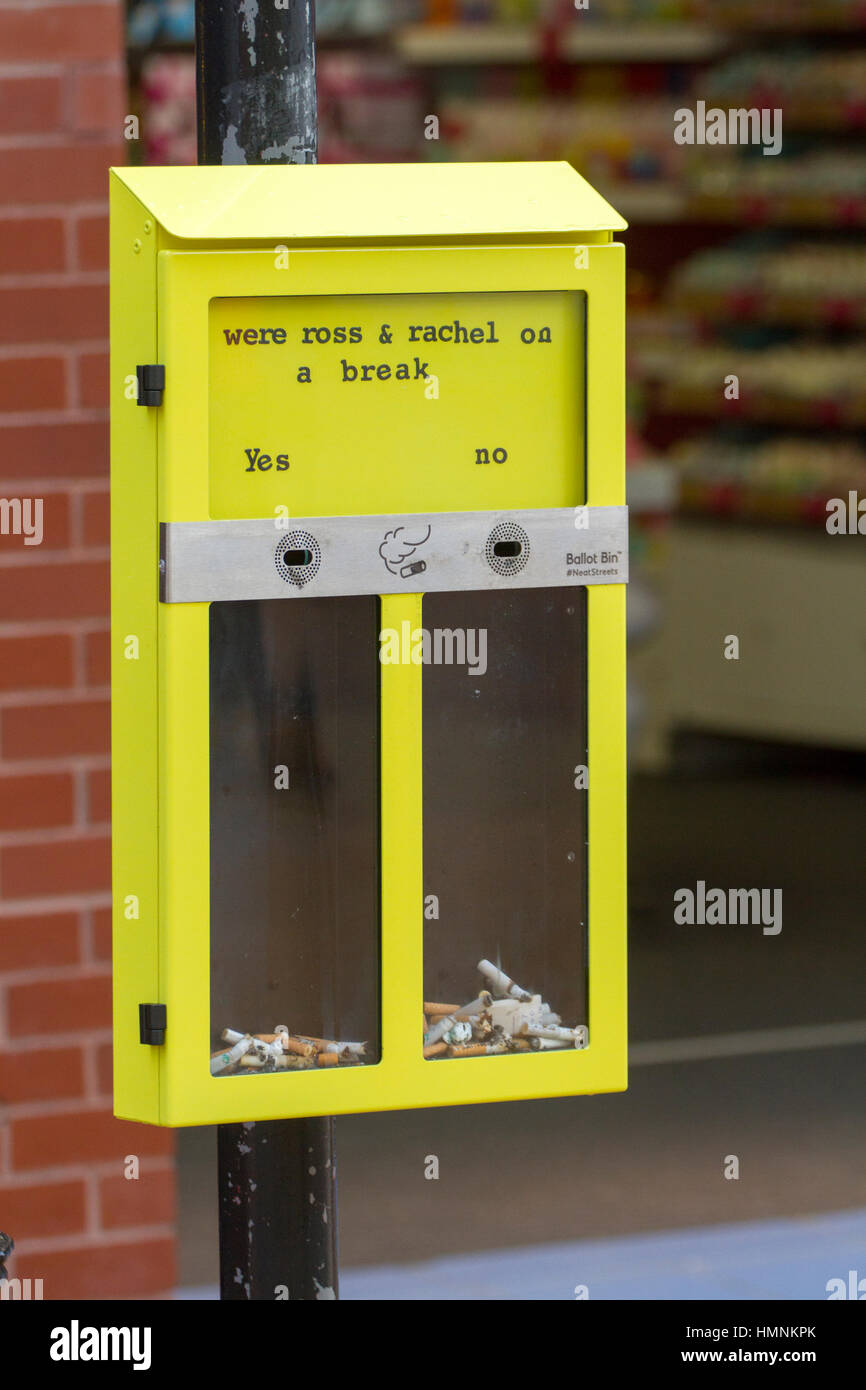 cigarette bins uk Friends Yellow questions, public opinion, street ashtrays, fag ends voting,  used butts, cigarette bins to reduce cigarette littering in Blackpool, UK  Stock Photo