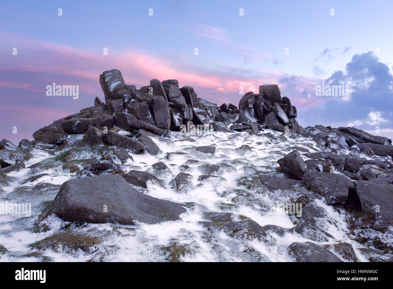 Winter sunset on Belstone Tor Dartmoor National Park Devon UK Stock Photo