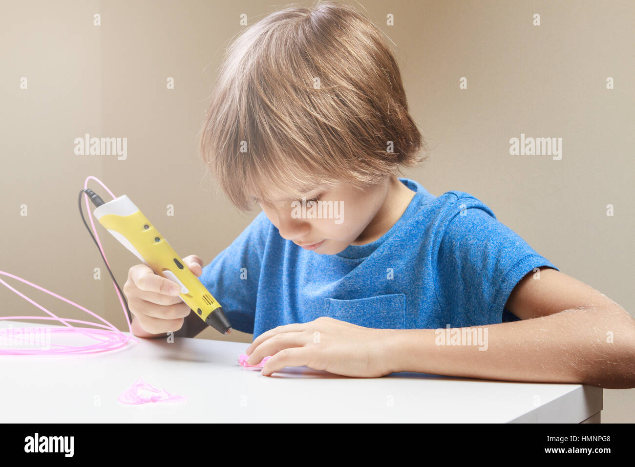 Child using 3D printing pen. Boy making new item. Creative, leisure ...