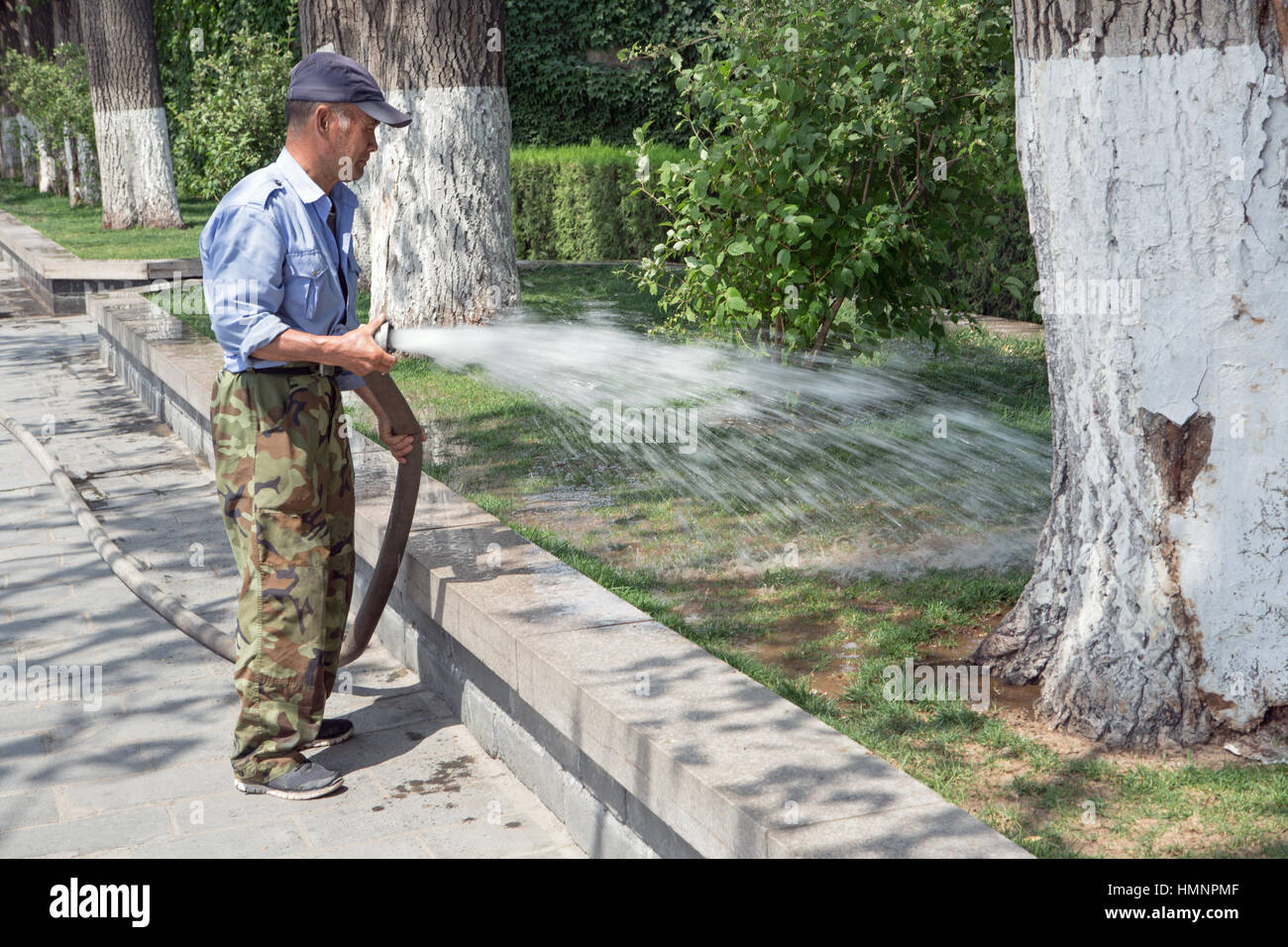 Watering the park, Summer Palace Beijing Stock Photo