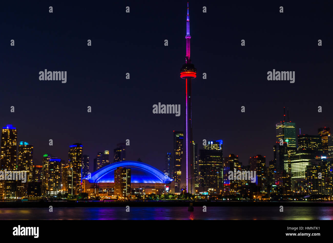 Skyline of Toronto over Ontario Lake after sunset Stock Photo - Alamy