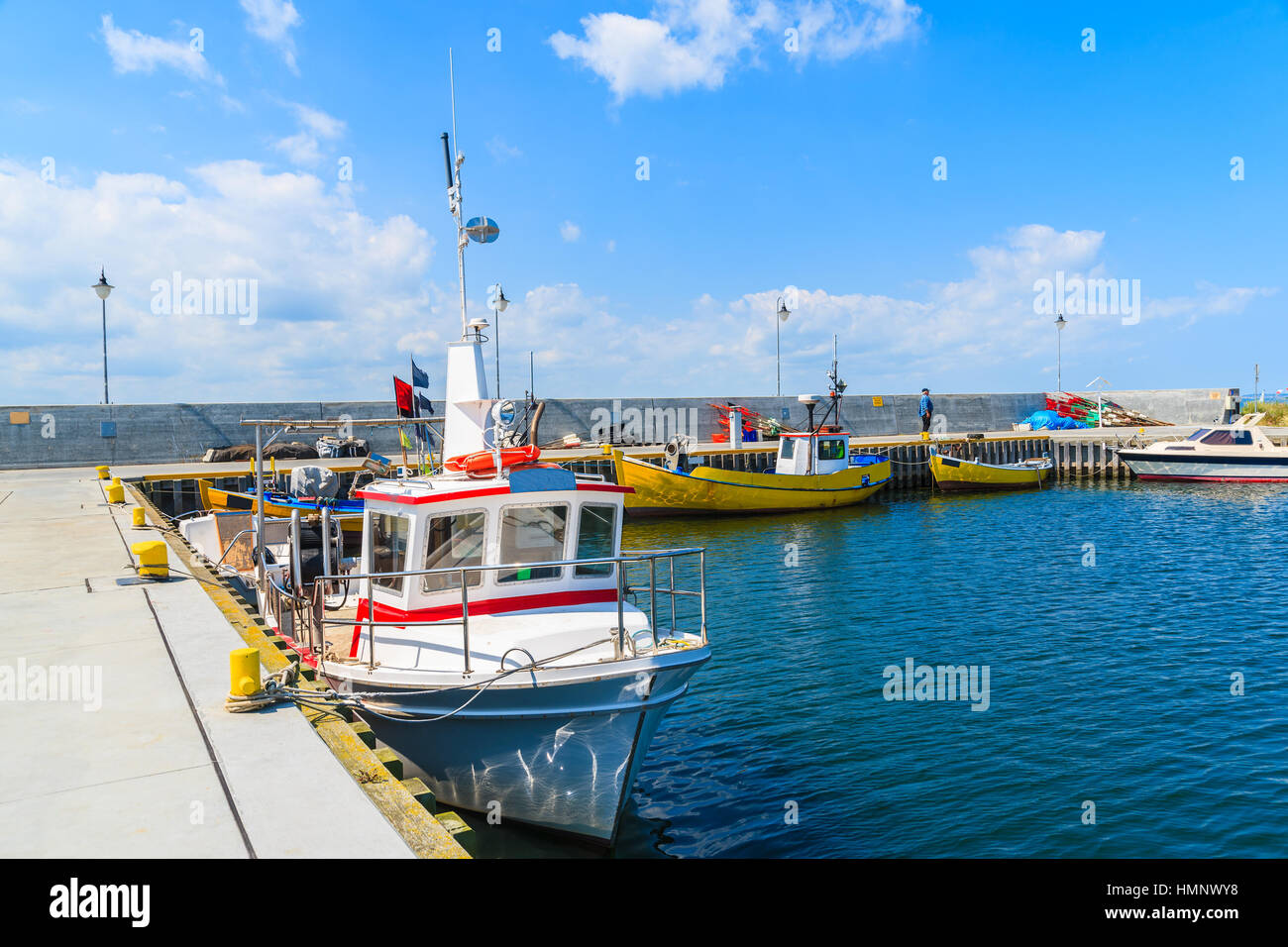 Colorful fishing boats anchoring in Kuznica port on Hel peninsula, Baltic Sea, Poland Stock Photo