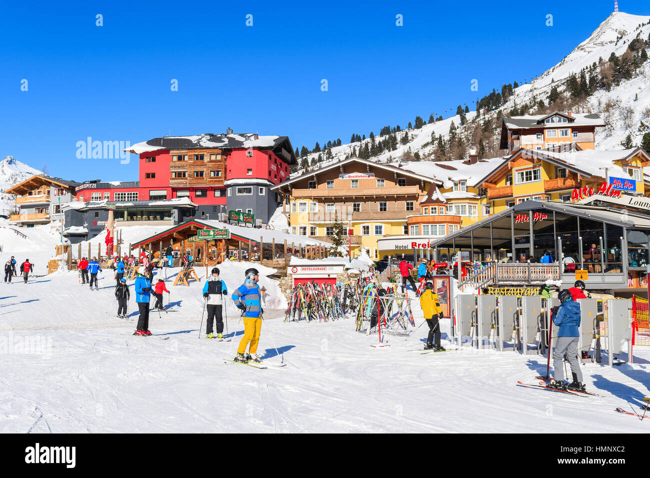 OBERTAUERN SKI RESORT, AUSTRIA - JAN 22, 2017: skiers on winter vacation in Obertauern ski area in Salzburg land, Austrian Alps. Stock Photo