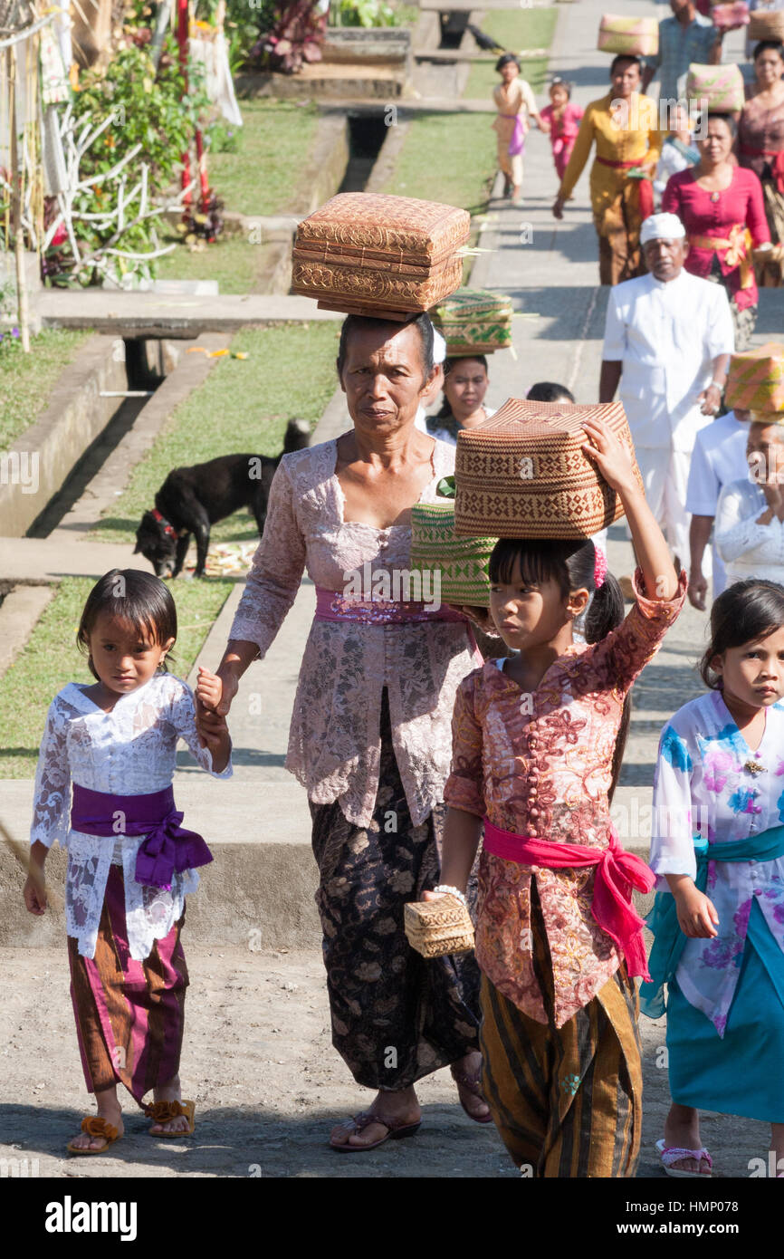 People walking to the temple during the Gaungan festival Stock Photo