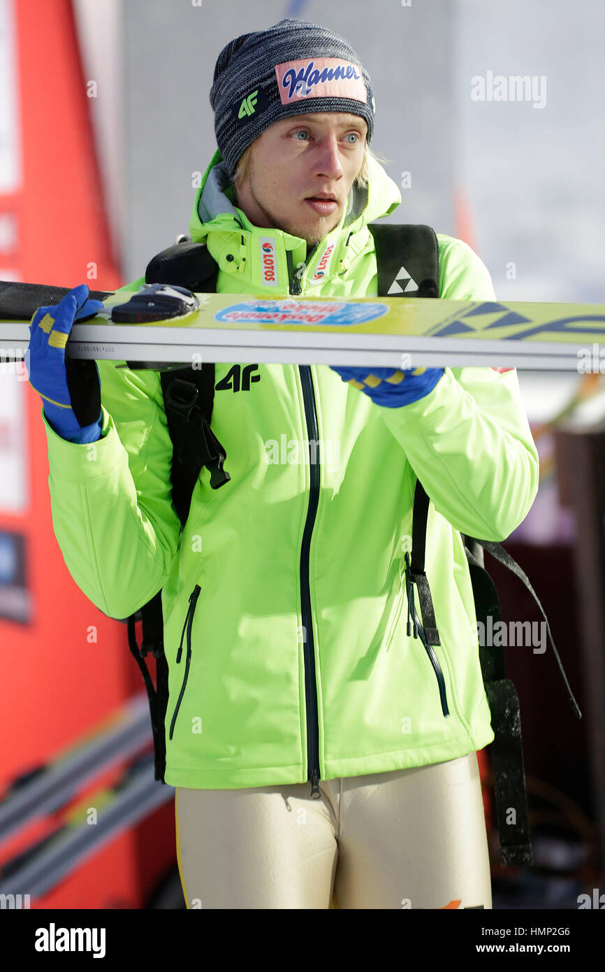 ZAKOPANE, POLAND - JANUARY 22, 2016: FIS Ski Jumping World Cup in Zakopane o/p Dawid Kubacki POL Stock Photo