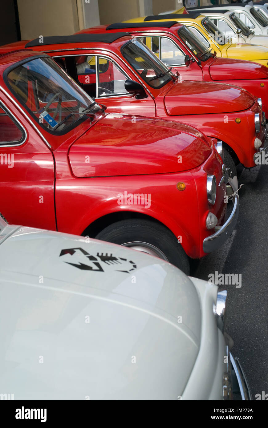 Vintage cars parked in a street in Imperia during the FIAT 500 Classic ...