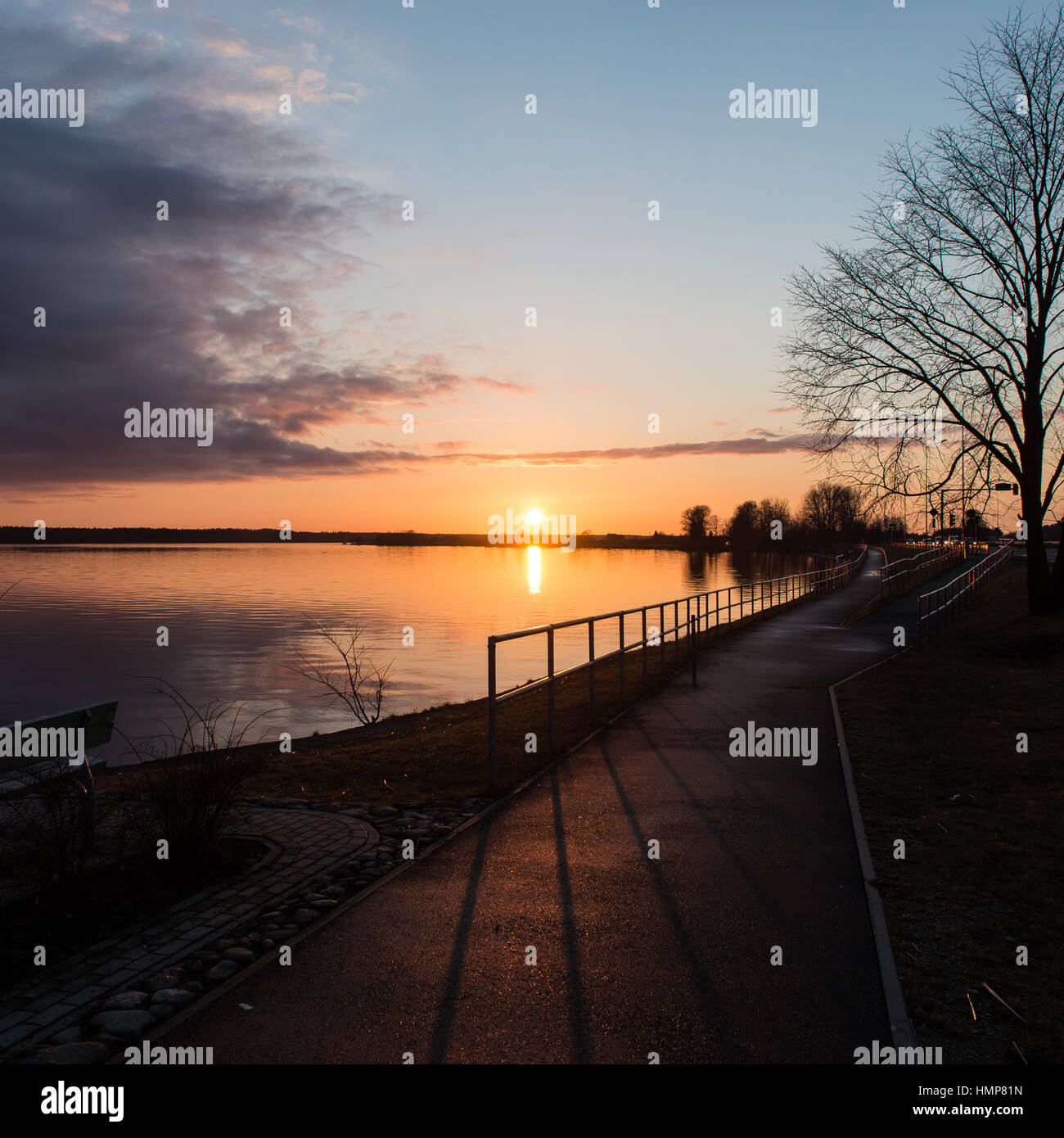 sunset over the sea with dramatic colorful sky Stock Photo - Alamy