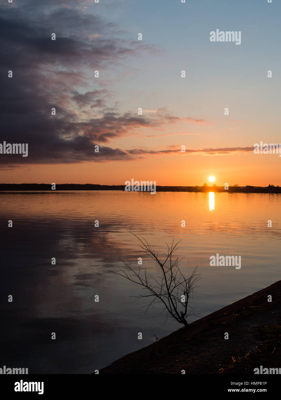 sunset over the sea with dramatic colorful sky Stock Photo - Alamy