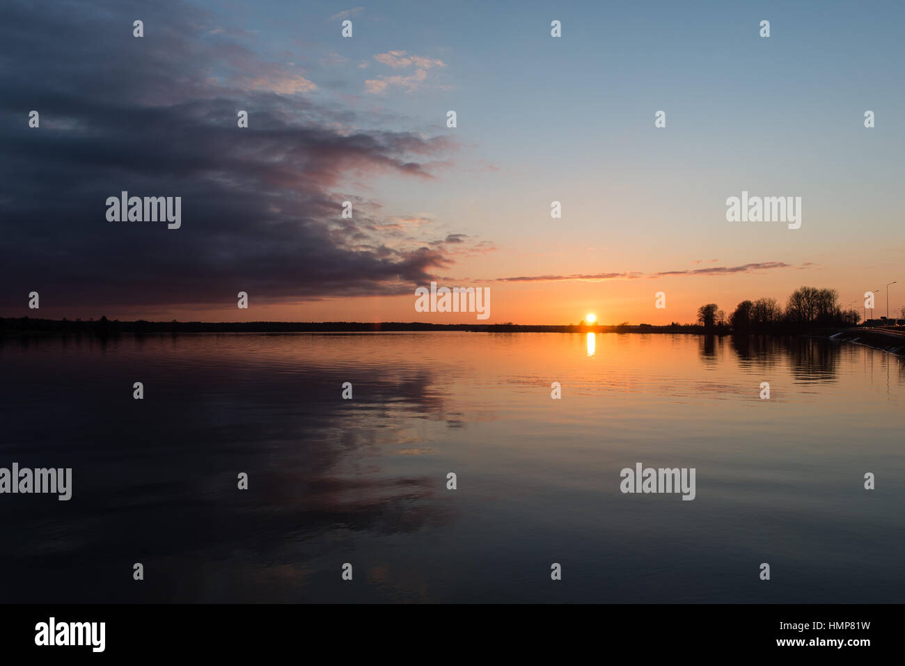 sunset over the sea with dramatic colorful sky Stock Photo - Alamy