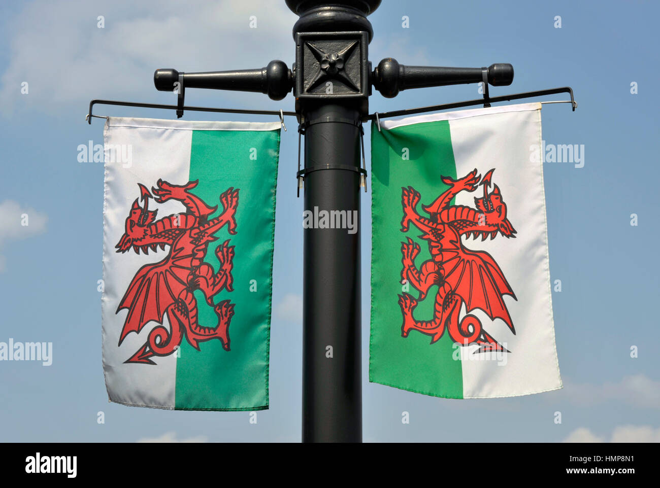 Pair of Welsh flags, welsh dragons, on a lamp post in Porthmadog, Wales