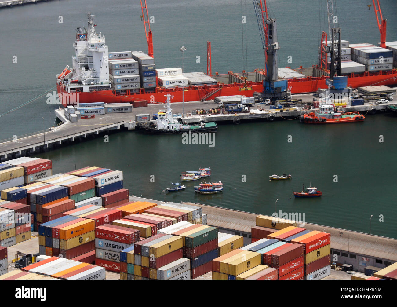 Freighter and shipping containers at dock, port of Arica, Chile Stock