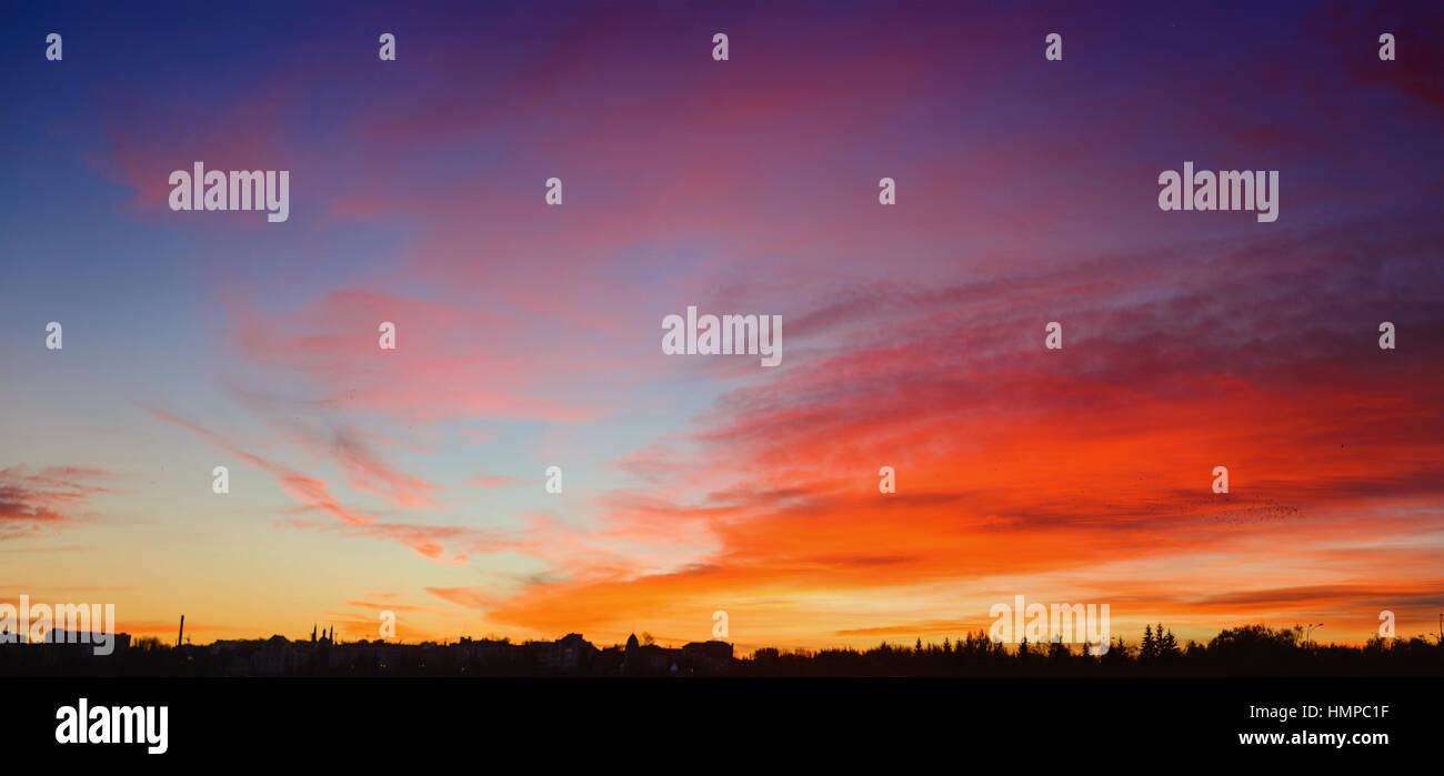 Colorful sunset over the mountain hills Stock Photo - Alamy