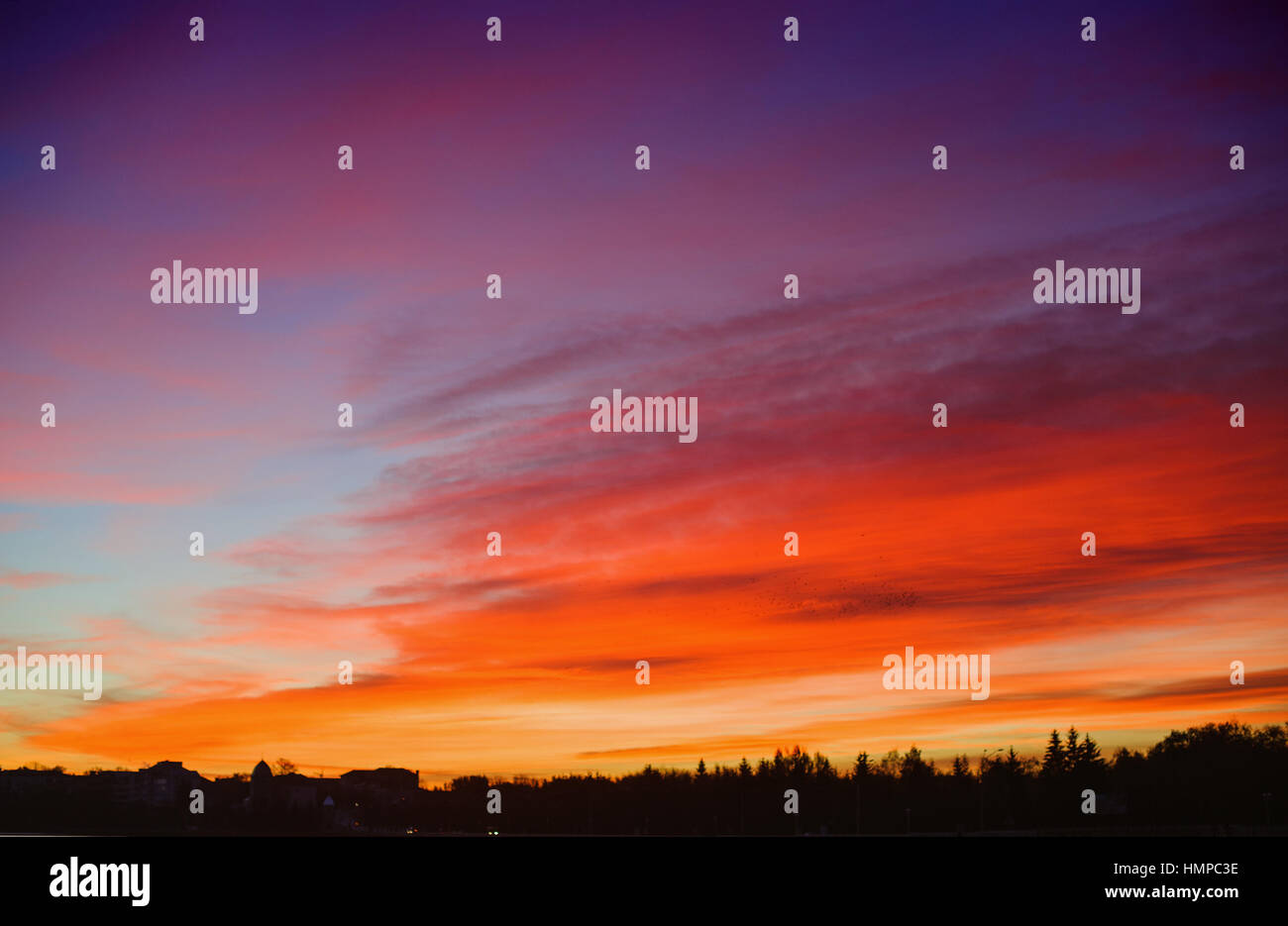 Colorful sunset over the mountain hills Stock Photo - Alamy