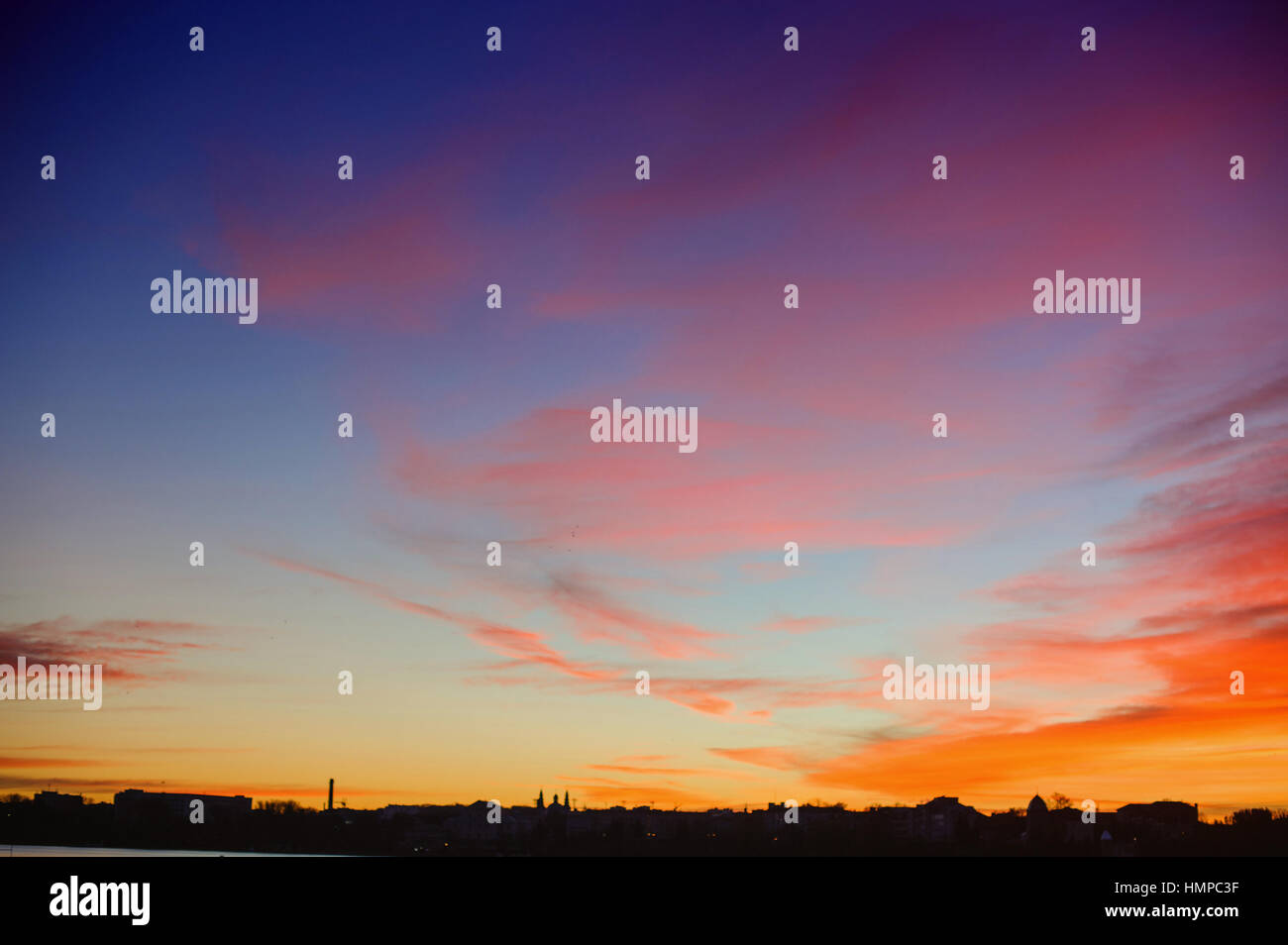 Colorful sunset over the mountain hills Stock Photo - Alamy