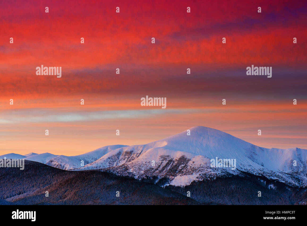 Colorful sunset over the mountain hills Stock Photo - Alamy