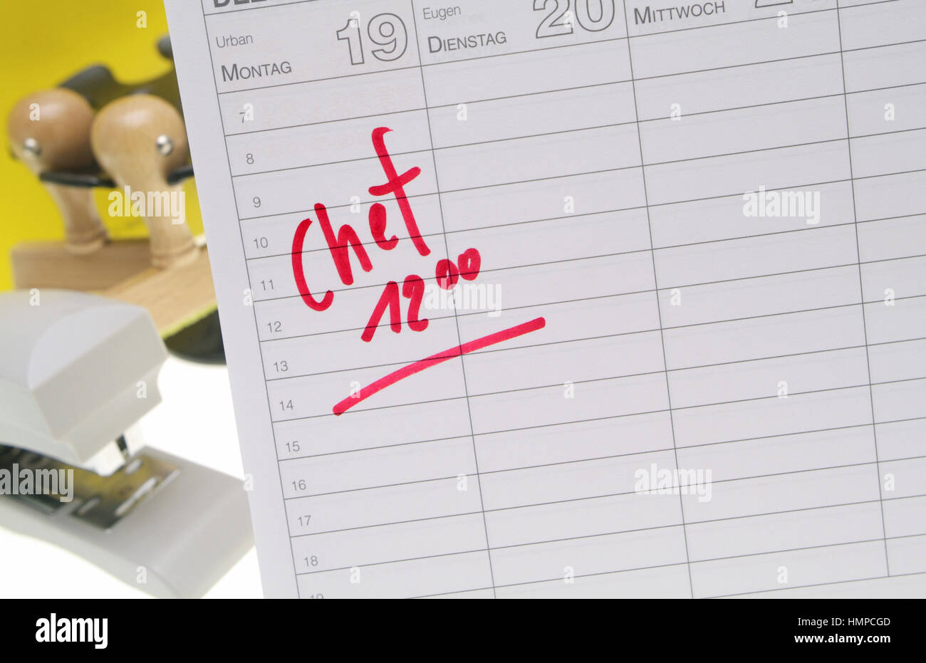 Notice on calendar, meeting with the boss Stock Photo