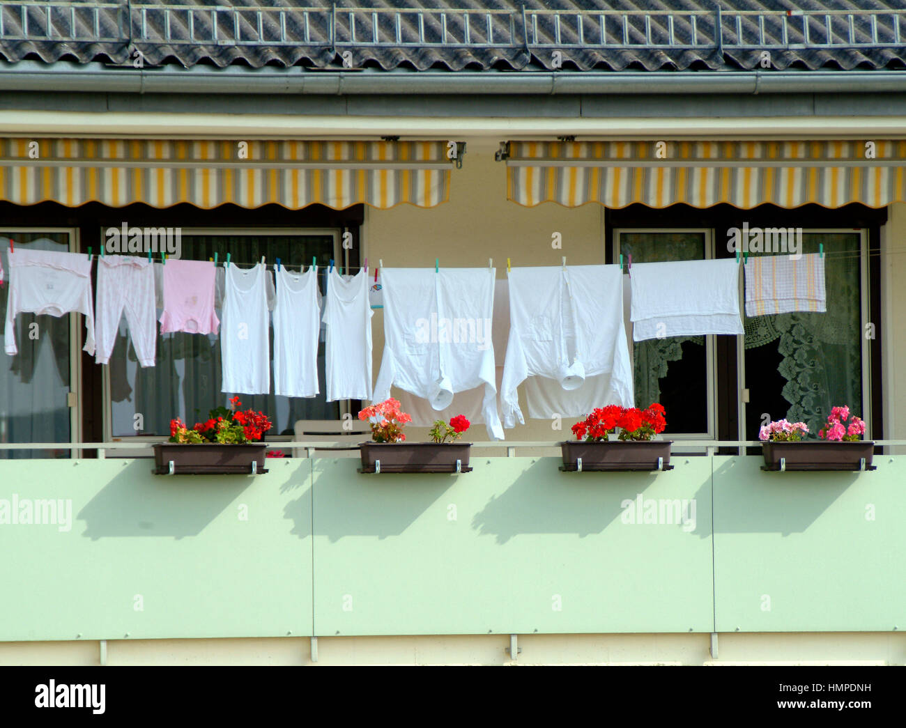 Drying clothes on balcony Stock Photo Alamy