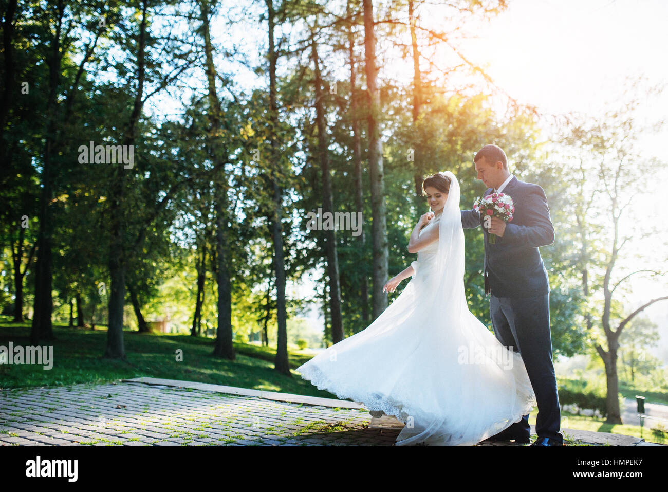 wedding couple dancing in the park Stock Photo - Alamy