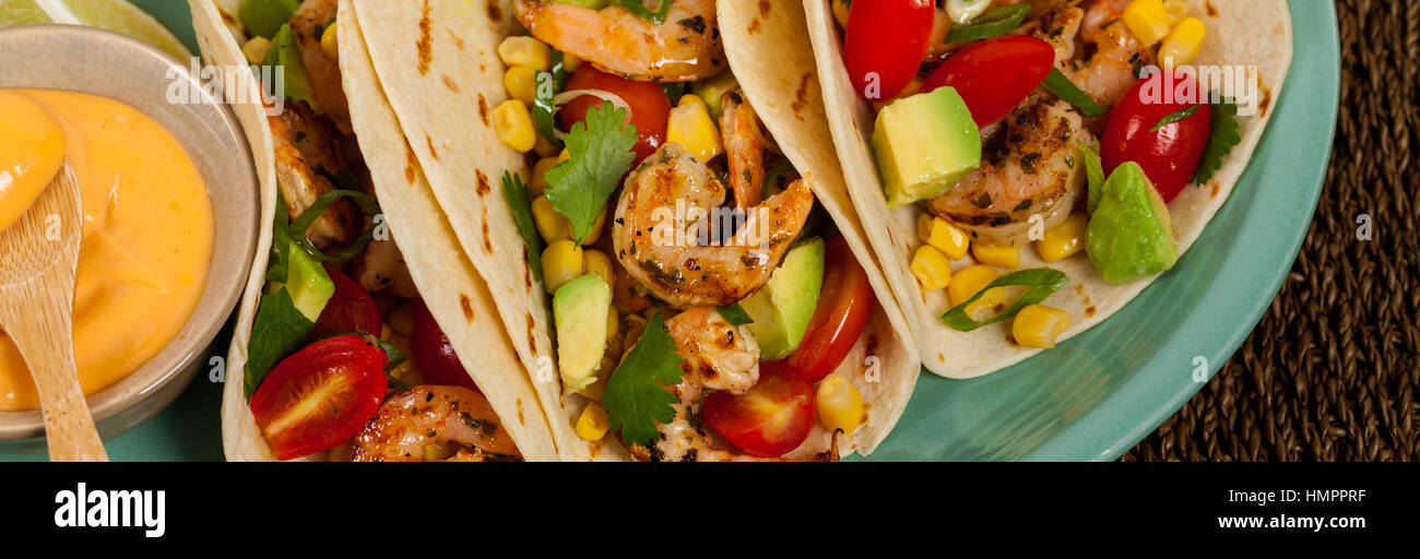 Shrimp Tacos with Corn and Avocado Salsa Stock Photo