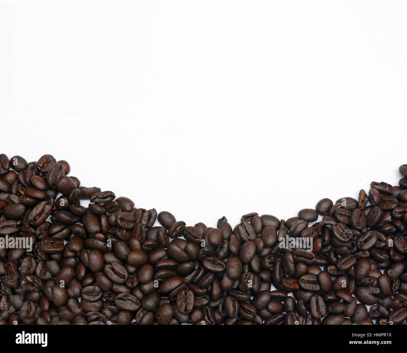 Roasted Coffee Beans on White background with copy space Stock Photo ...