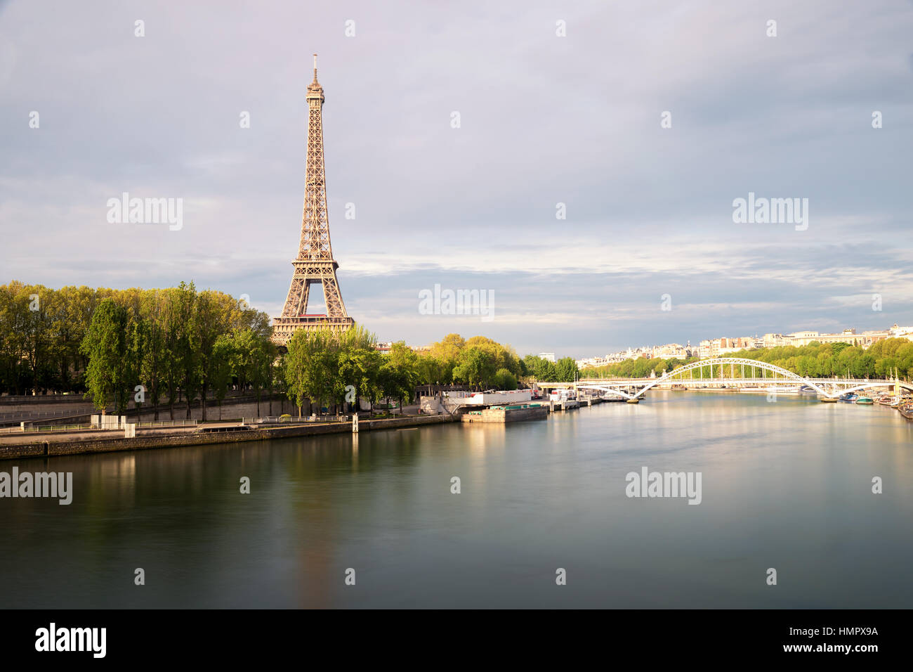 Eiffel tower in Paris from the river Seine in spring season. Paris, France. Stock Photo