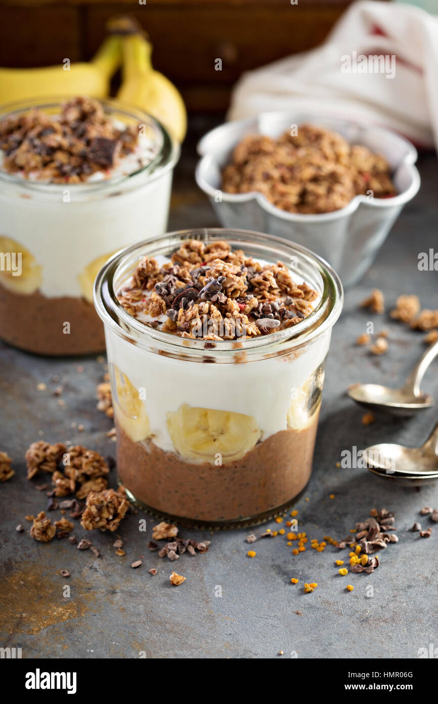 Chocolate Chia Pudding Parfait With Banana Granola And Yogurt Stock Photo Alamy