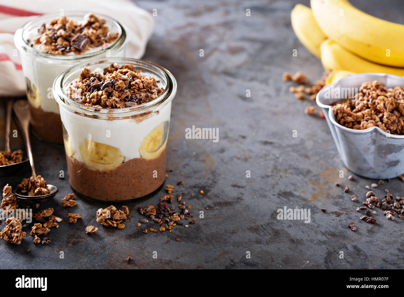 Chocolate Chia Pudding Parfait With Banana Granola And Yogurt Stock Photo Alamy