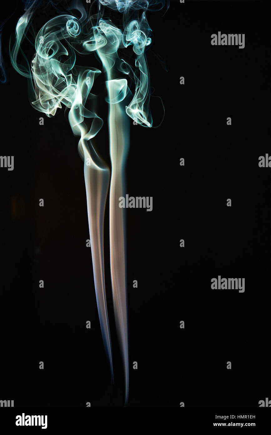 close up of colorful smoke lines on black Stock Photo
