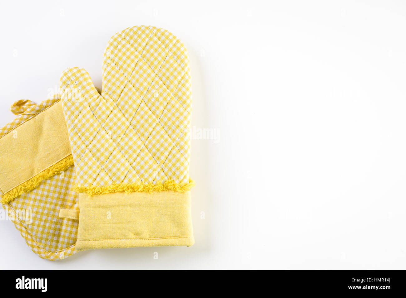 Yellow oven mitt on a white background Stock Photo Alamy