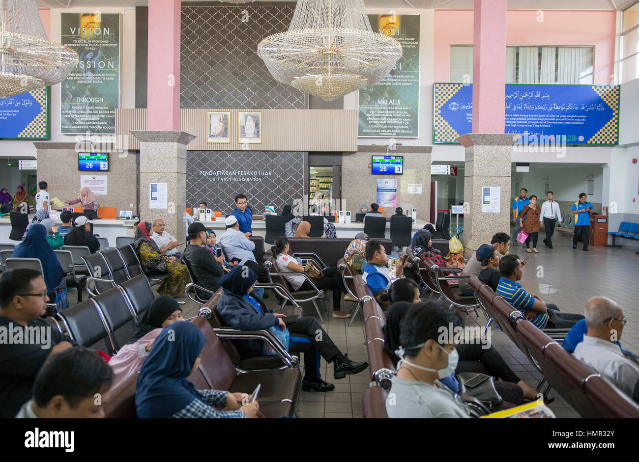 People are seen seated in the registration lobby of the Women & Child ...