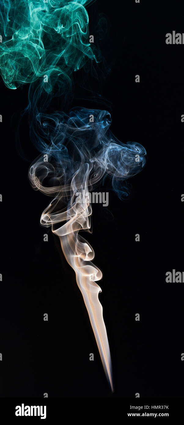 stylish colorful smoke curves  on black background Stock Photo