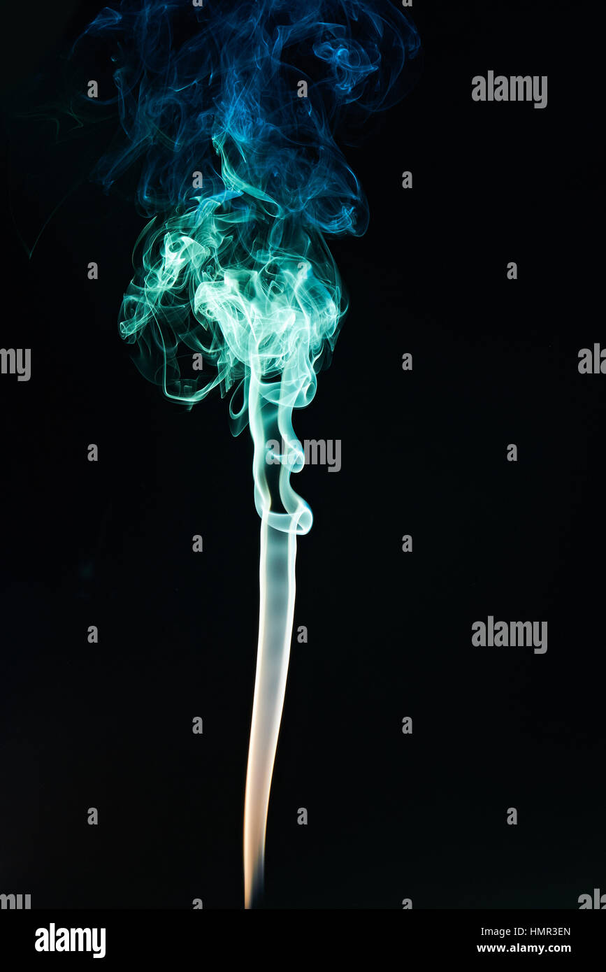 colorful line of smoke on black background Stock Photo
