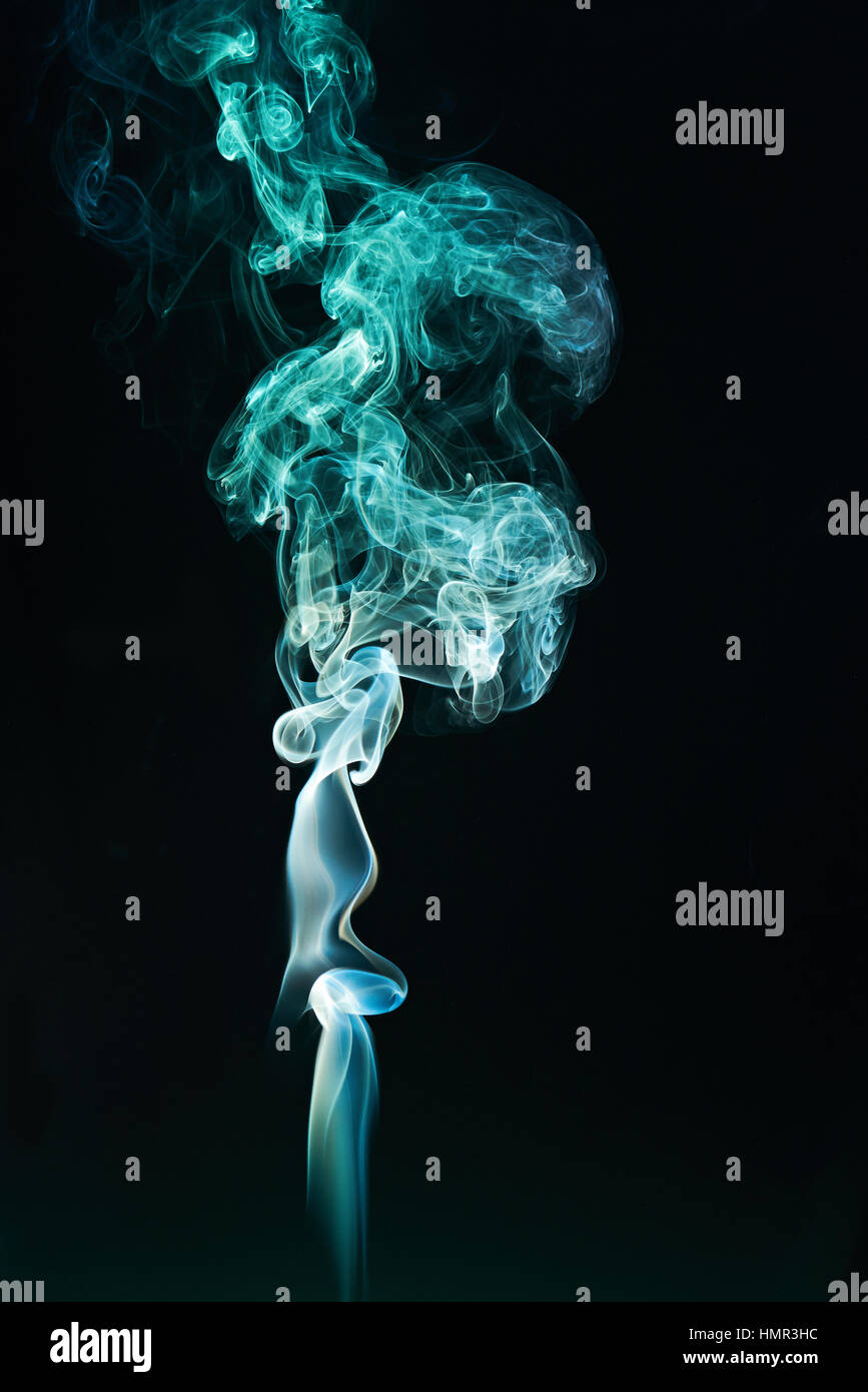 green smoke cloud on black background Stock Photo - Alamy