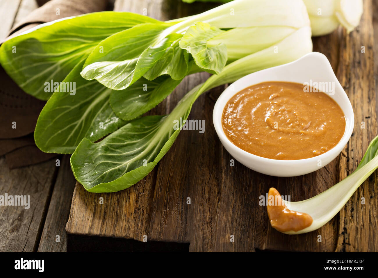Baby bok choy with peanut spicy sauce Stock Photo Alamy