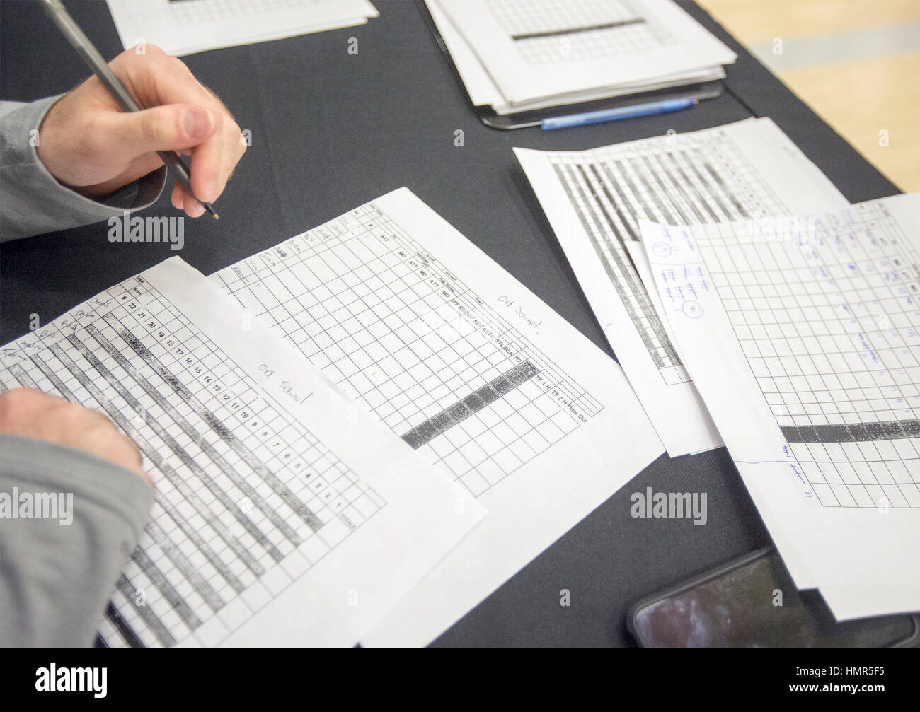 Scorekeeper at a basketball game Stock Photo - Alamy