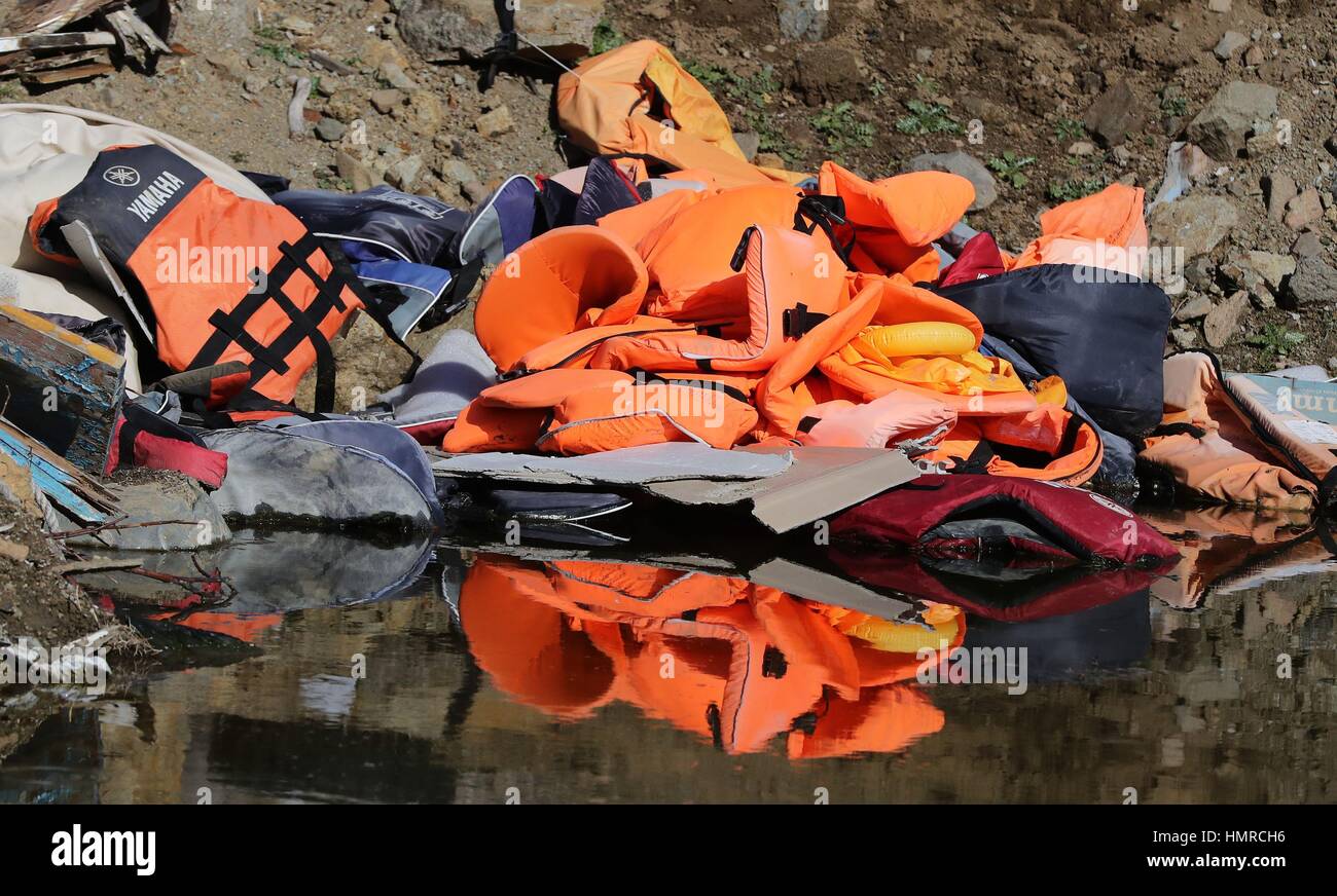 Used life jackets on the Greek island of Lesbos, where British expatriate Eric Kempson is battling to save lives on the Greek island of Lesbos and warned the refugee crisis in Greece is far from over. Stock Photo