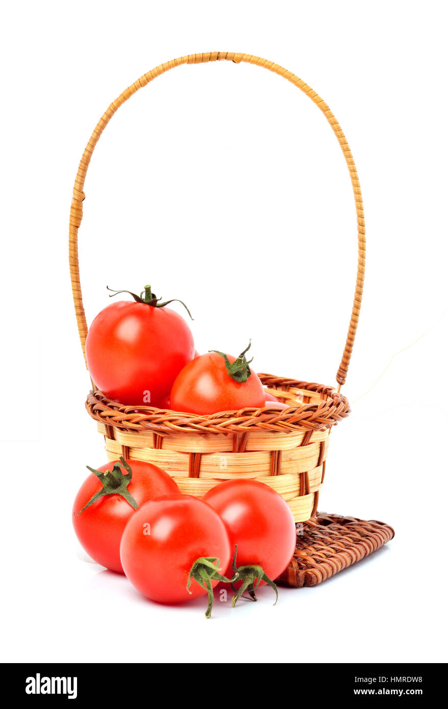 cherry tomatoes in the basket isolated on white Stock Photo - Alamy