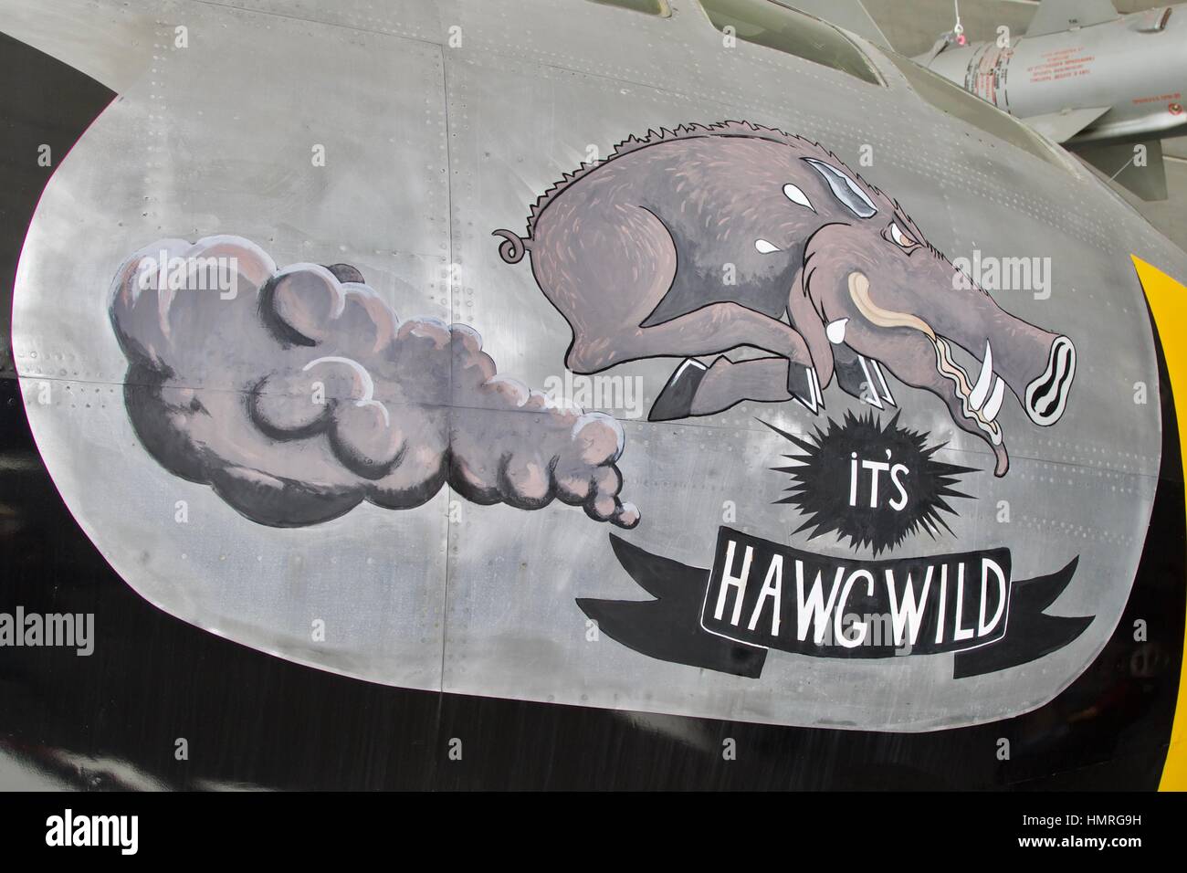 Boeing B-29 Superfortress nose art 'its Hawg Wild' on static display at the American Air Museum Stock Photo